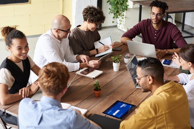 This image shows the collaboration required to deliver great products to customers.