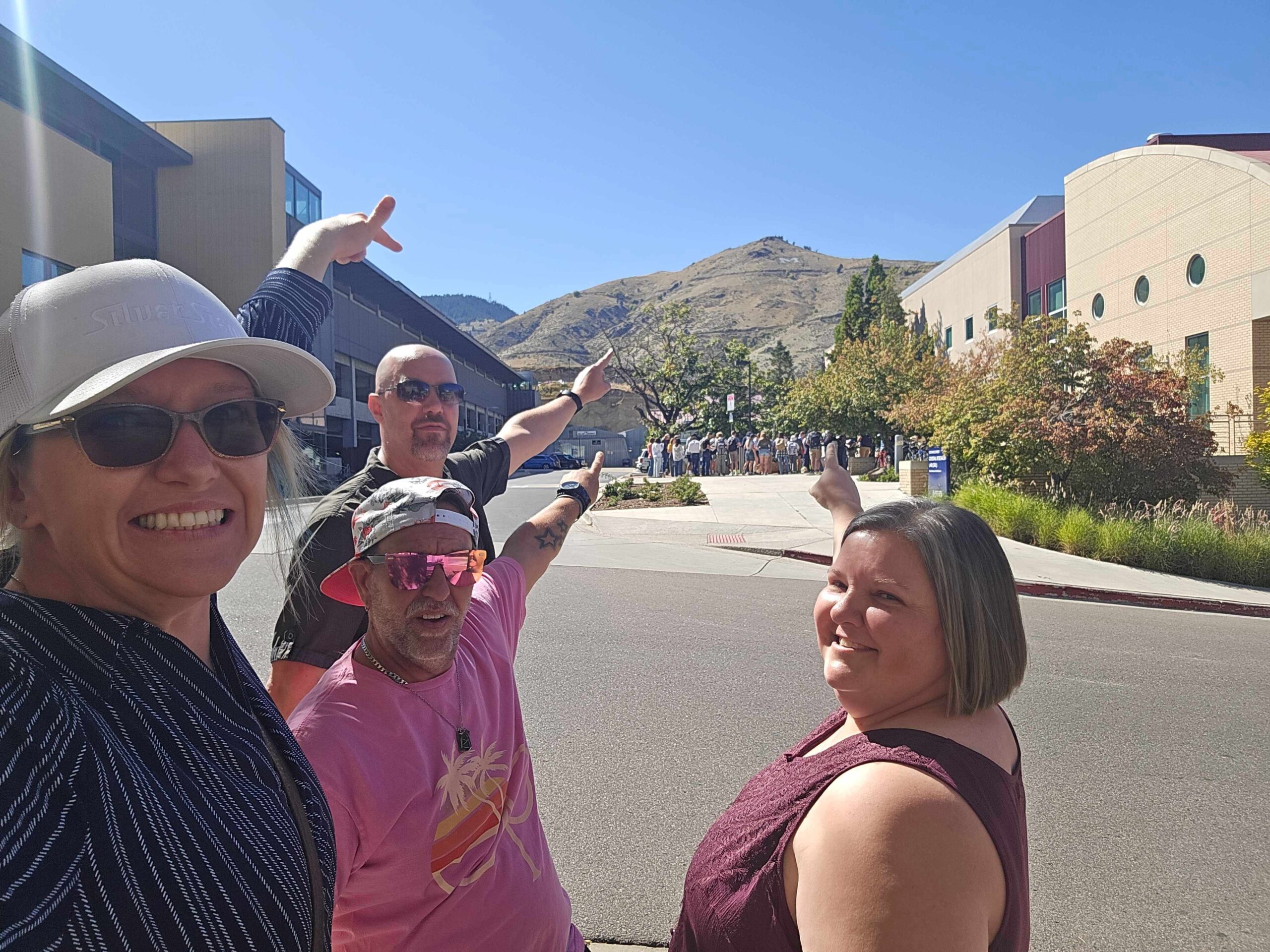 This image shows one of the teams taking a picture of a mountain for the scavenger hunt.