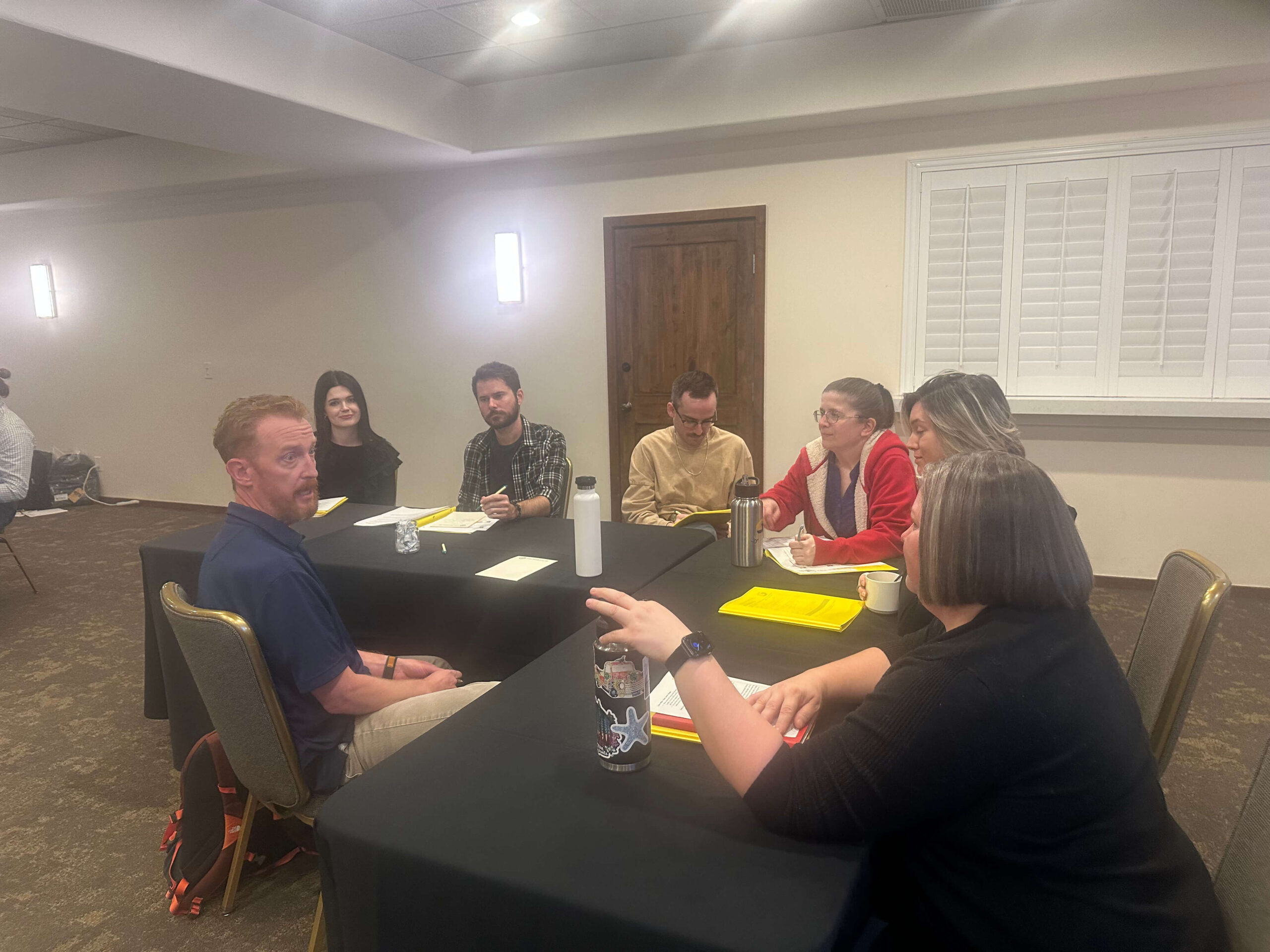 This image shows our customer support team speaking with a power user at a Discovery Circle.