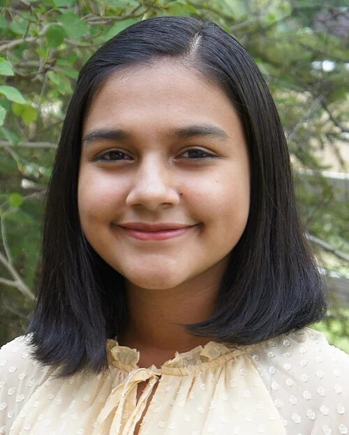 This image shows Gitanjali Rao, a young inventor and STEM advocate recognized for developing technologies focused on public health, water quality, and cyber safety.
