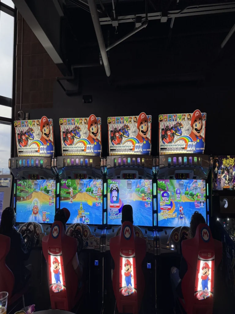 IMG_5447_2100x2800 This is our Sales and Marketing Team playing Mario Kart at the arcade.