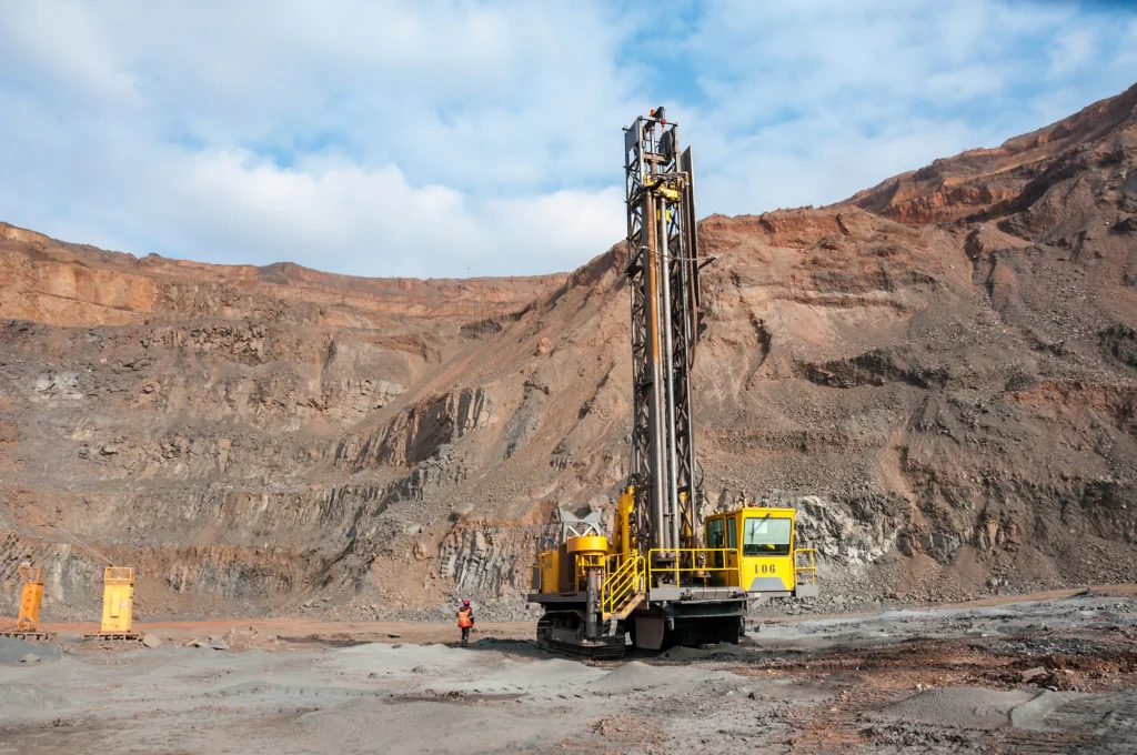 An engineer is drilling for a mineral exploration project.